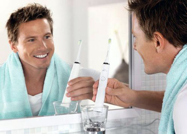 使用电动牙刷的小方法（使用电动牙刷的小方法是什么）
